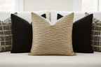Champagne Ripple Hero with Black & Grid Pillows on White Linen Sofa