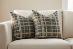 Milan Plaid Pillows on Cream Sofa